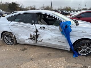 2015 Ford Fusion Hybrid Titanium - Primary Damage Straight On Image
